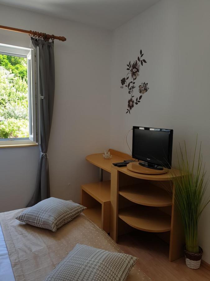 Apartmani I Sobe Jusic ราบ ภายนอก รูปภาพ