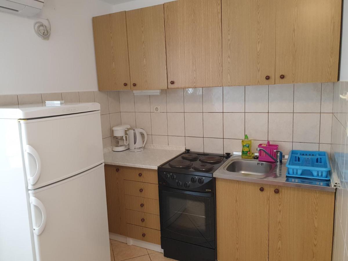 Apartmani I Sobe Jusic ราบ ภายนอก รูปภาพ